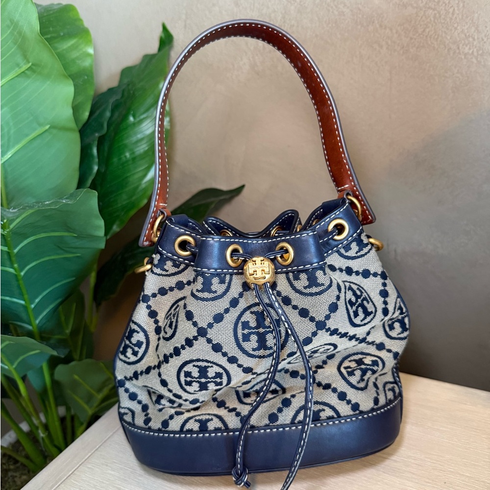 T MONOGRAM BUCKET BAG